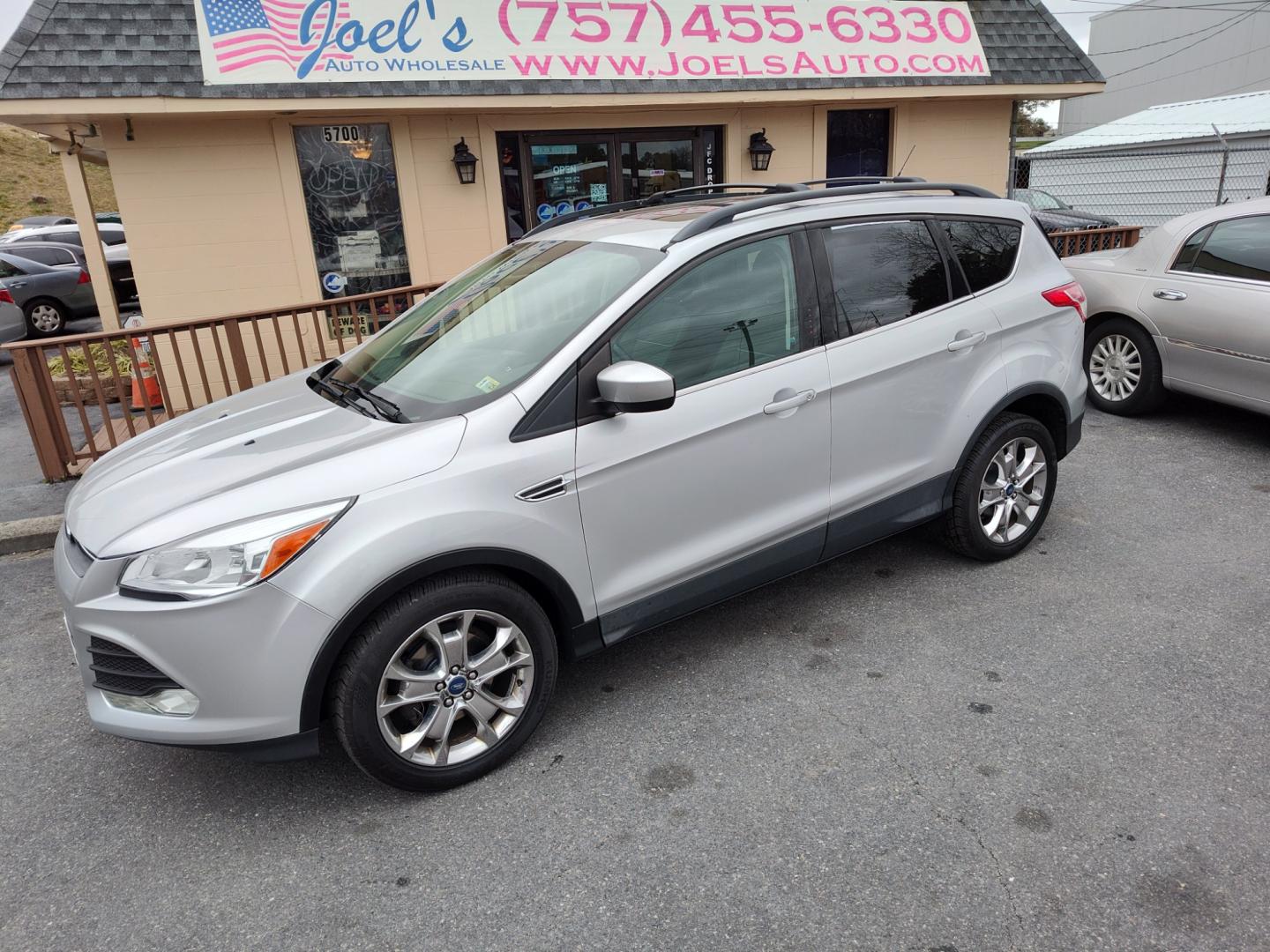 2014 Silver Ford Escape (1FMCU0GX7EU) , Automatic transmission, located at 5700 Curlew Drive, Norfolk, VA, 23502, (757) 455-6330, 36.841885, -76.209412 - Photo#0